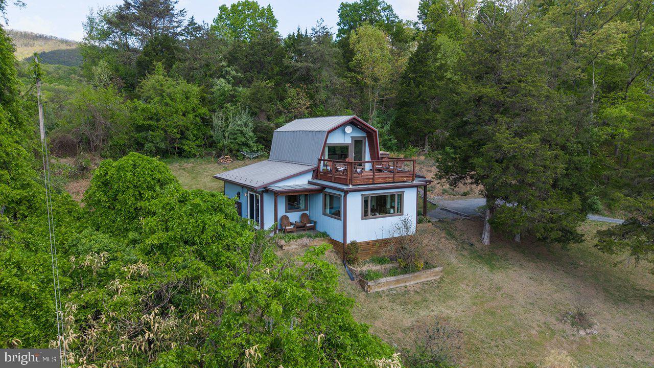6261 South Page Valley Road Luray, VA 22835 - Photo 45 of 55 a view of a house with a yard
