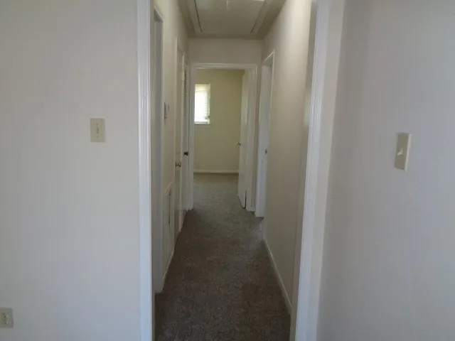 an empty room with an entryway