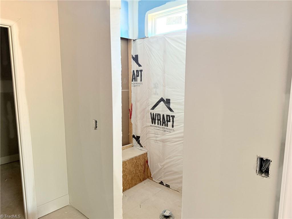8307 Pyramid Drive Summerfield, NC 27358 - Photo 17 of 29 Ensuite bathroom walk-in shower