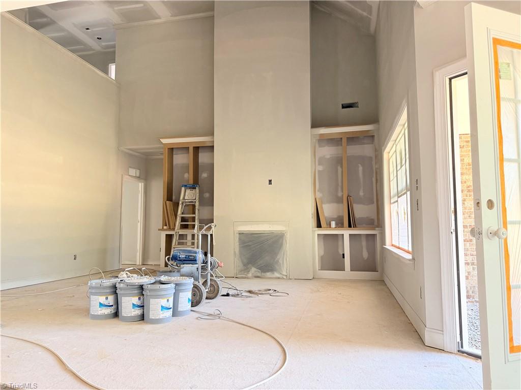 8307 Pyramid Drive Summerfield, NC 27358 - Photo 2 of 29 Great room with fireplace and built-ins