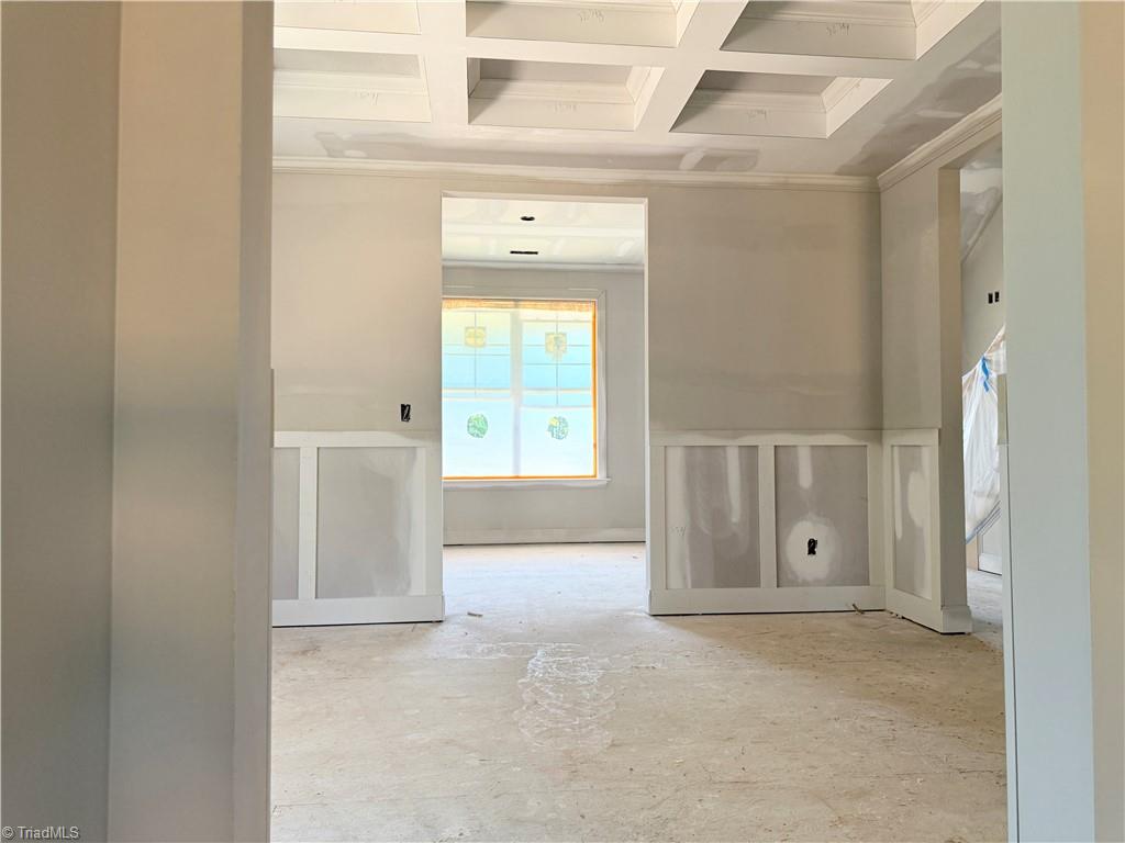 8307 Pyramid Drive Summerfield, NC 27358 - Photo 8 of 29 Dining room with coffered ceilng