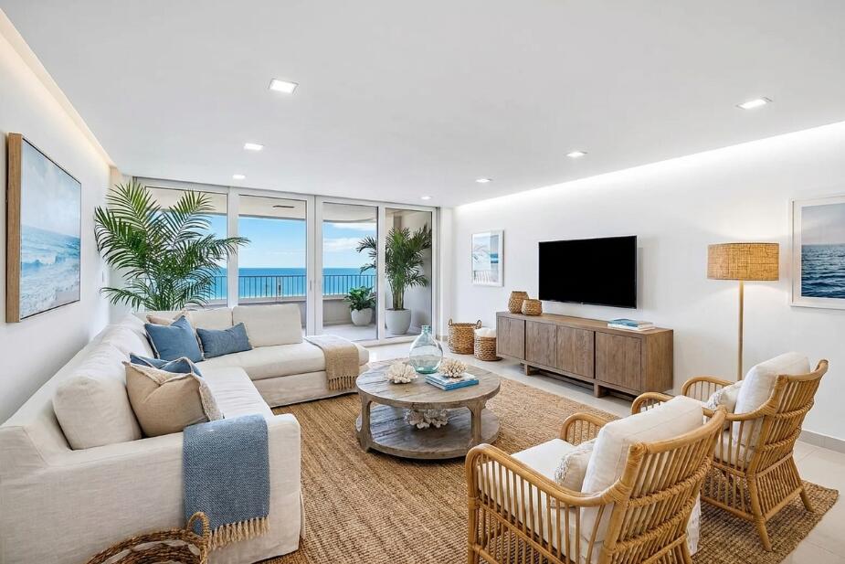 550 South Ocean Boulevard, Unit 2207 Boca Raton, FL 33432 - Photo 1 of 42 a living room with furniture and a flat screen tv