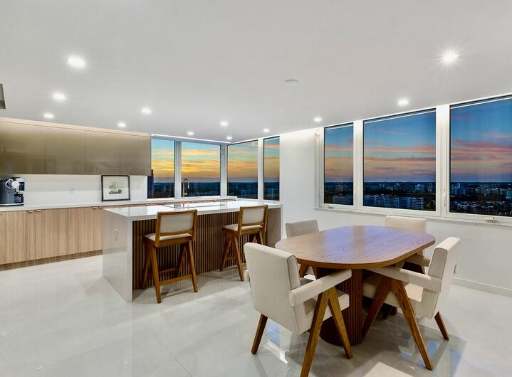 550 South Ocean Boulevard, Unit 2207 Boca Raton, FL 33432 - Photo 12 of 42 a dinning table and chairs in a room
