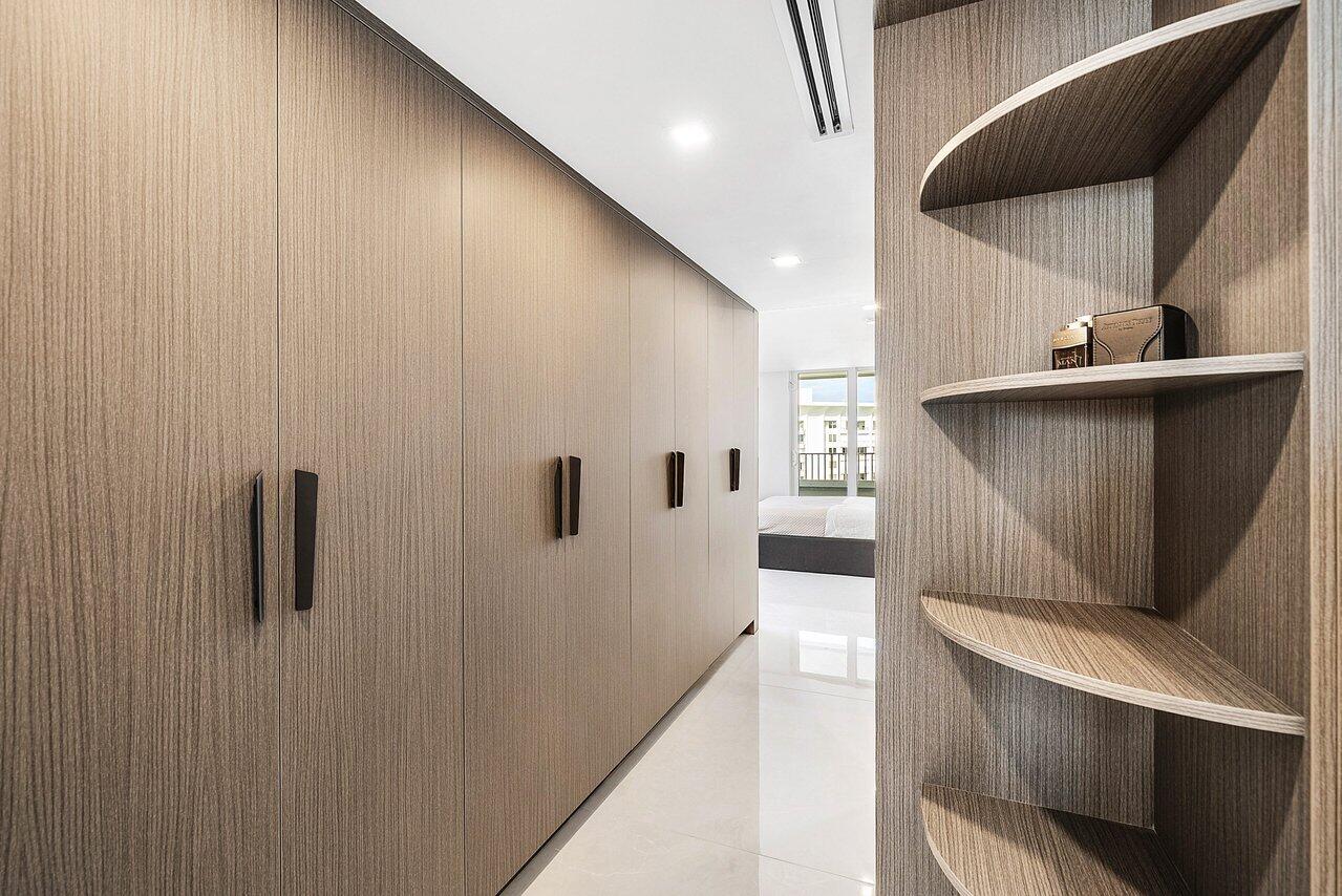 550 South Ocean Boulevard, Unit 2207 Boca Raton, FL 33432 - Photo 18 of 42 a view of a hallway with staircase