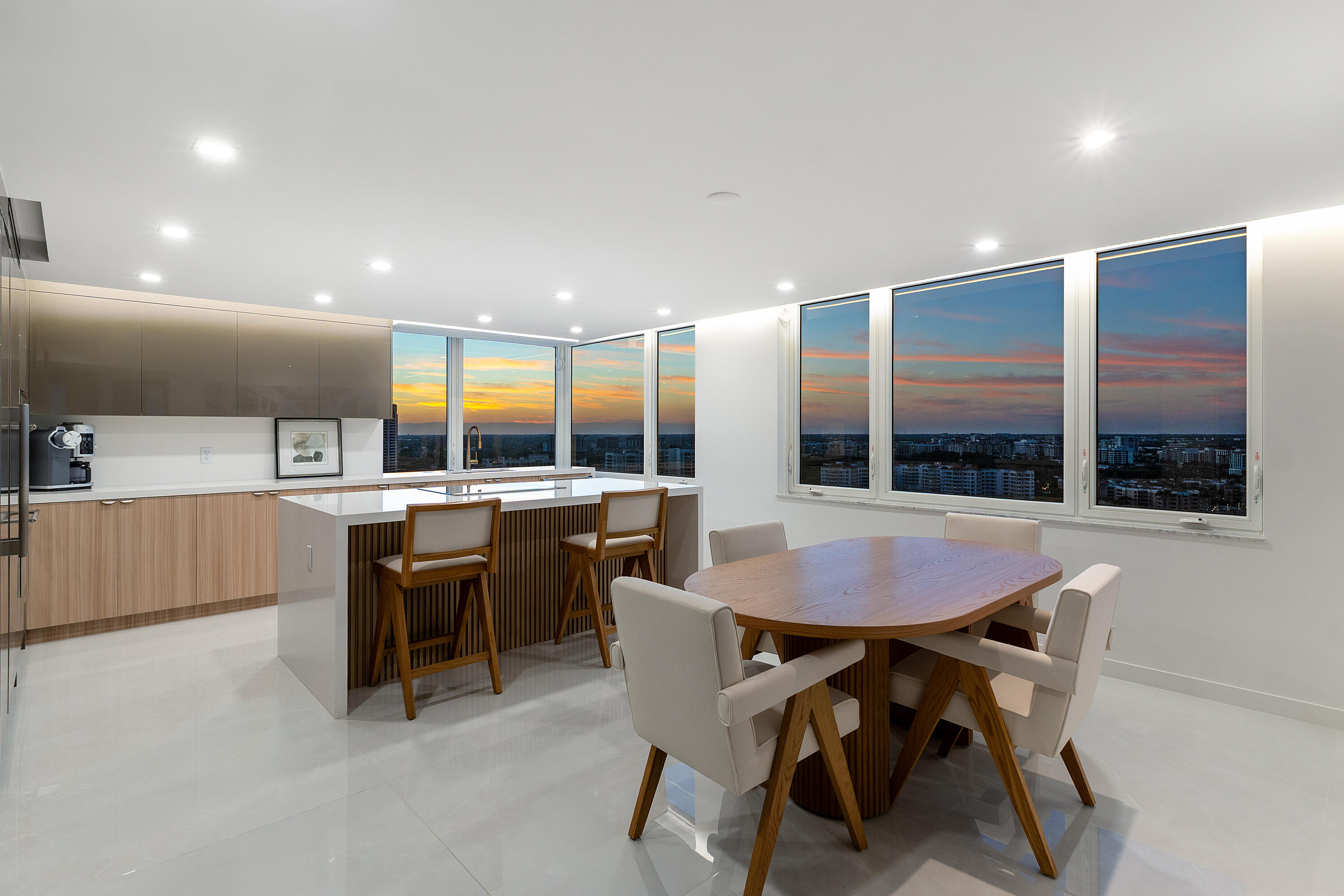 550 South Ocean Boulevard, Unit 2207 Boca Raton, FL 33432 - Photo 29 of 42 a dining room with furniture and a large window