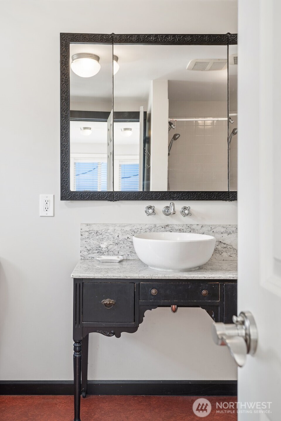 5119 Sudbury Road Walla Walla, WA 99362 - Photo 17 of 40 a bathroom with a sink and a mirror