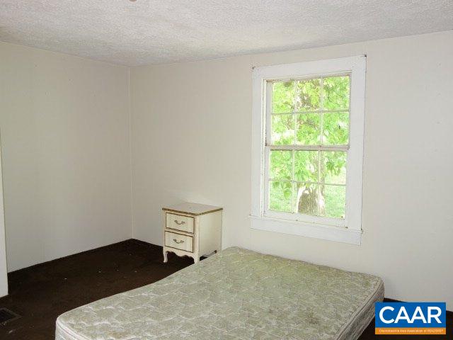 2208 Salem Road Schuyler, VA 22969 - Photo 11 of 21 a bedroom with a bed and a window