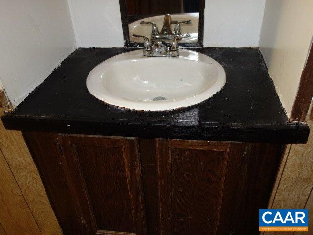 2208 Salem Road Schuyler, VA 22969 - Photo 17 of 21 a close view of a sink and table in a kitchen