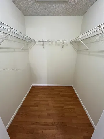 a view of a room with racks on the wall