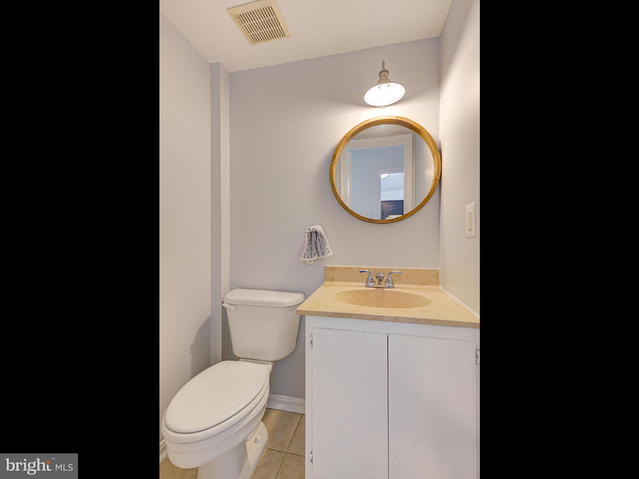 5271 Bradgen Court Springfield, VA 22151 - Photo 16 of 47 A Half Bath rounds out the Main Level