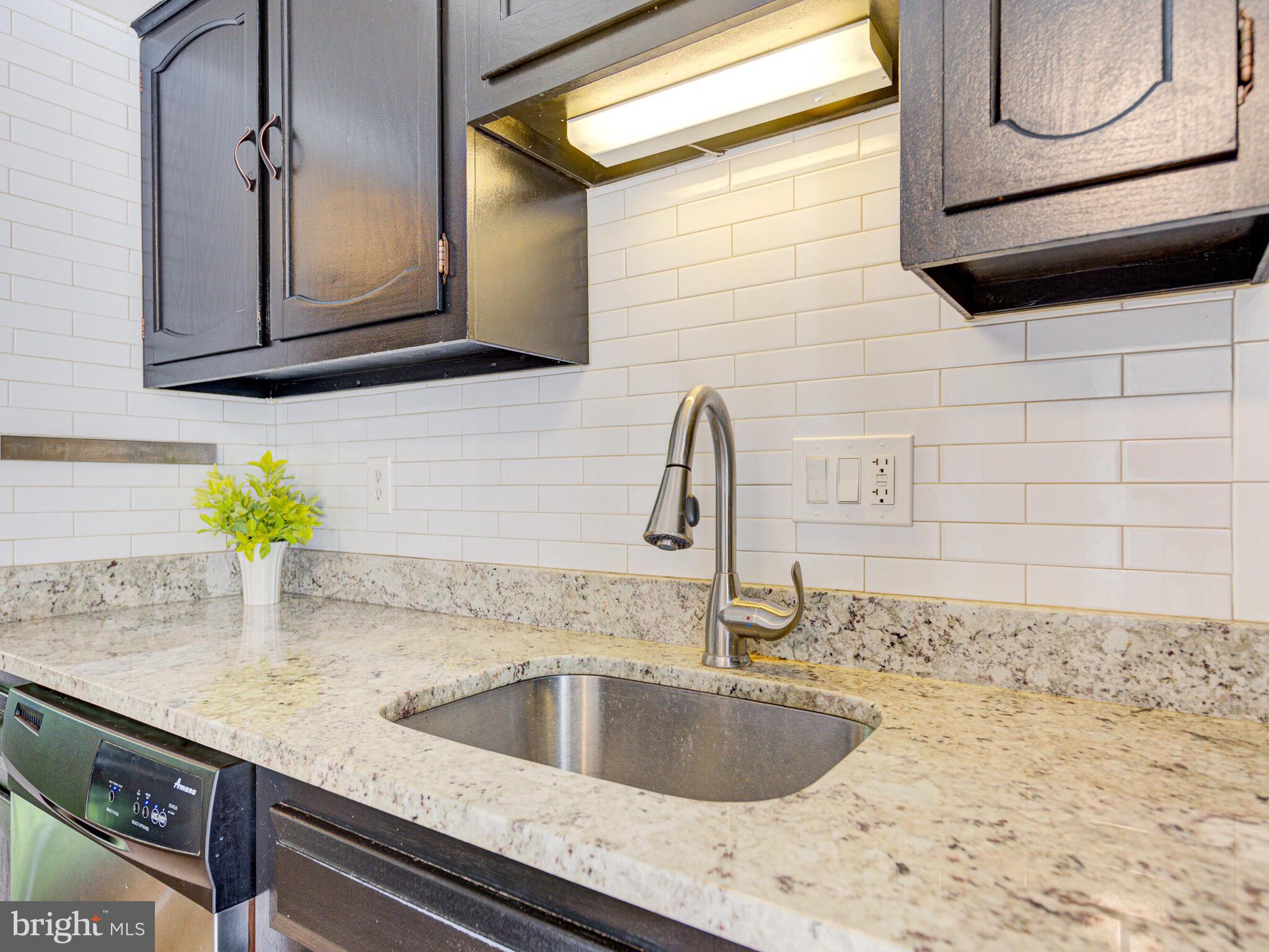 Granite counter tops + Subway Tile backsplash