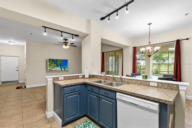 a kitchen with a sink and a window