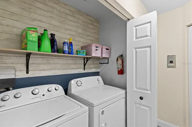 a utility room with dryer and washer