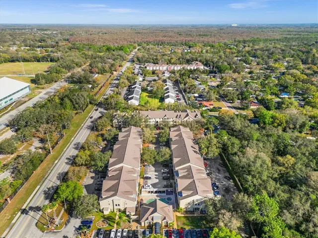 an aerial view of residential building with outdoor space
