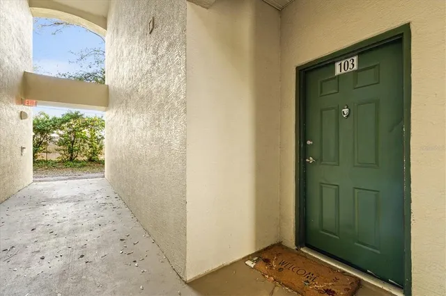 a view of a bathroom with a shower and a sink