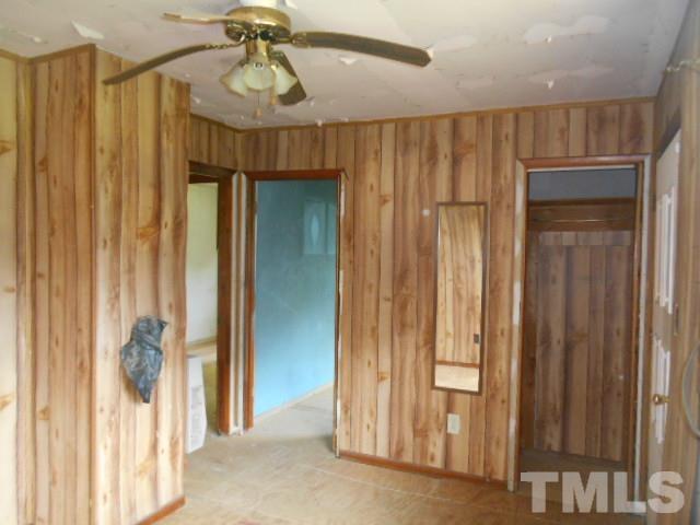3837 Edgemont Road Wendell, NC 27591 - Photo 6 of 10 a view of a hallway with a chandelier
