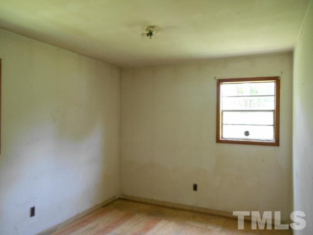 3837 Edgemont Road Wendell, NC 27591 - Photo 9 of 10 an empty room with a window
