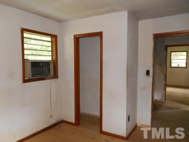 3837 Edgemont Road Wendell, NC 27591 - Photo 10 of 10 a view of a hallway with wooden floor and closet