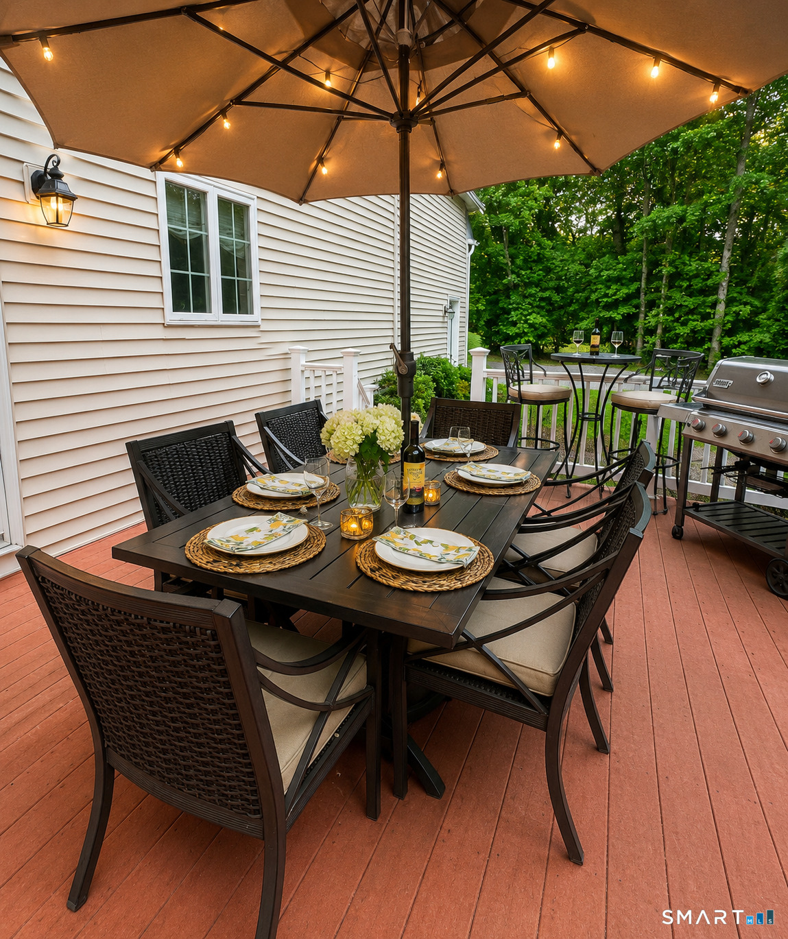 4 Ortense Road Wallingford, CT 06492 - Photo 31 of 33 a backyard of a house with table and chairs