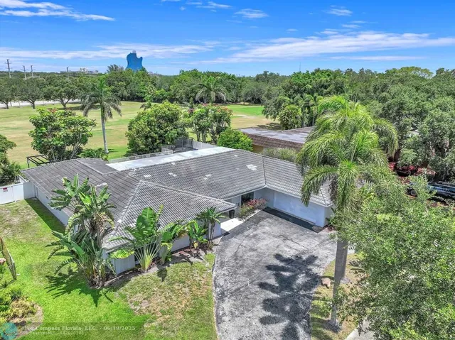 a view of a street with an outdoor space
