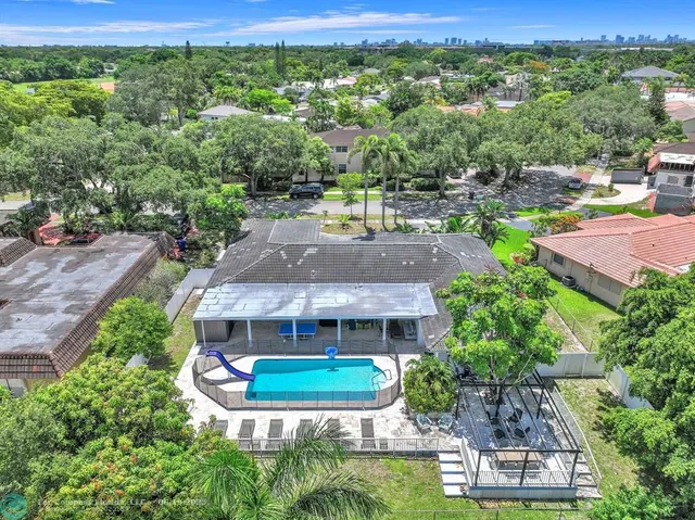 an aerial view of a house with a garden view