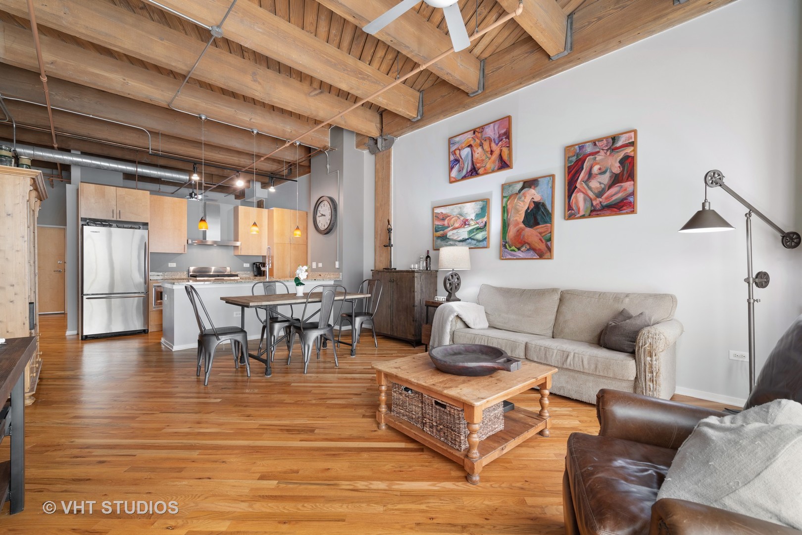 1040 West Adams Street, Unit 248 Chicago, IL 60607 - Photo 3 of 19 a living room with furniture and a large window