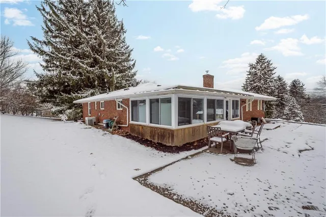 a view of snow on the side of road