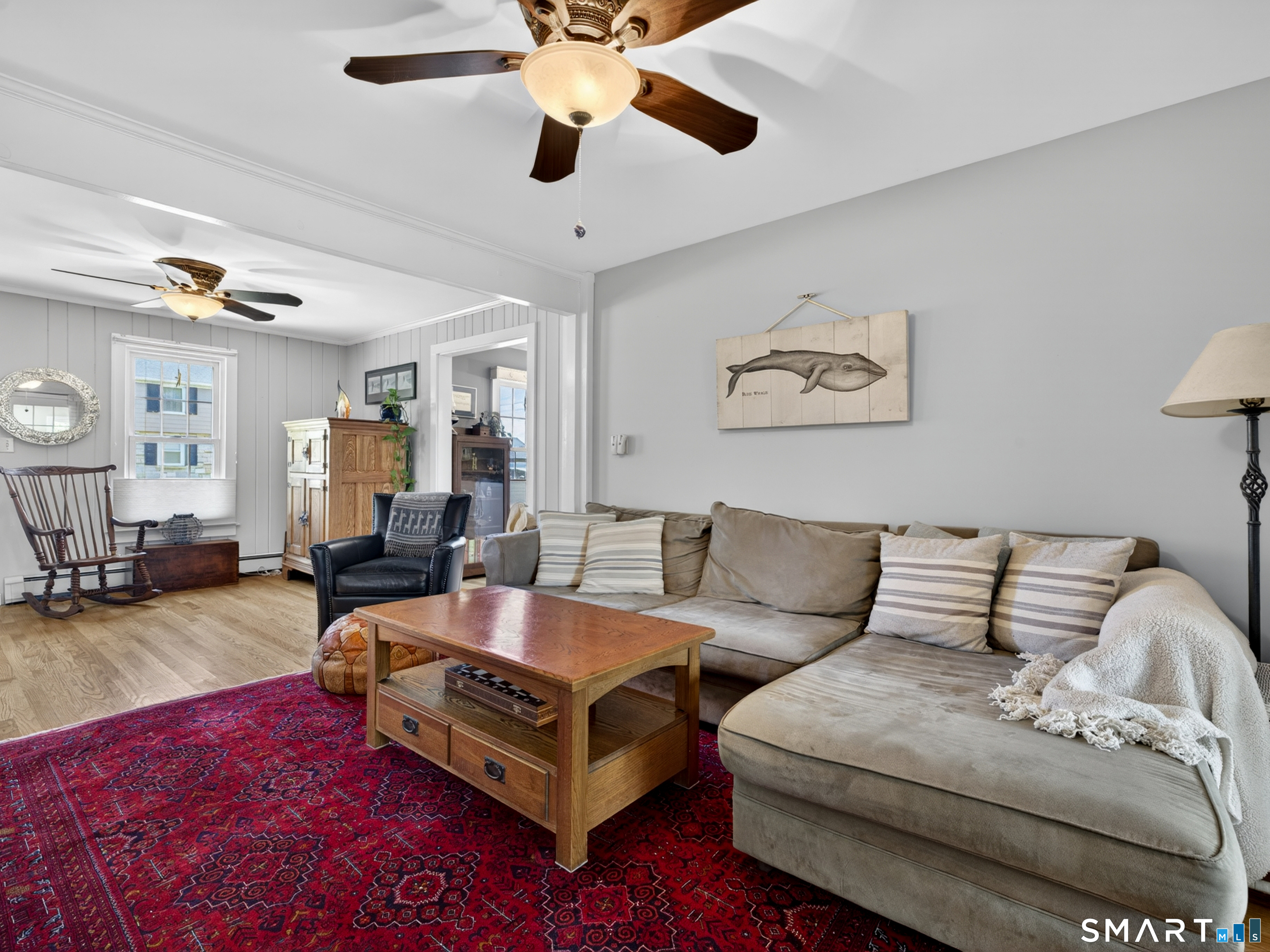82 Pratt Road Clinton, CT 06413 - Photo 6 of 40 Ceiling fans and the French doors leading out to the sunroom, create a casual, and comfortable environment year round.