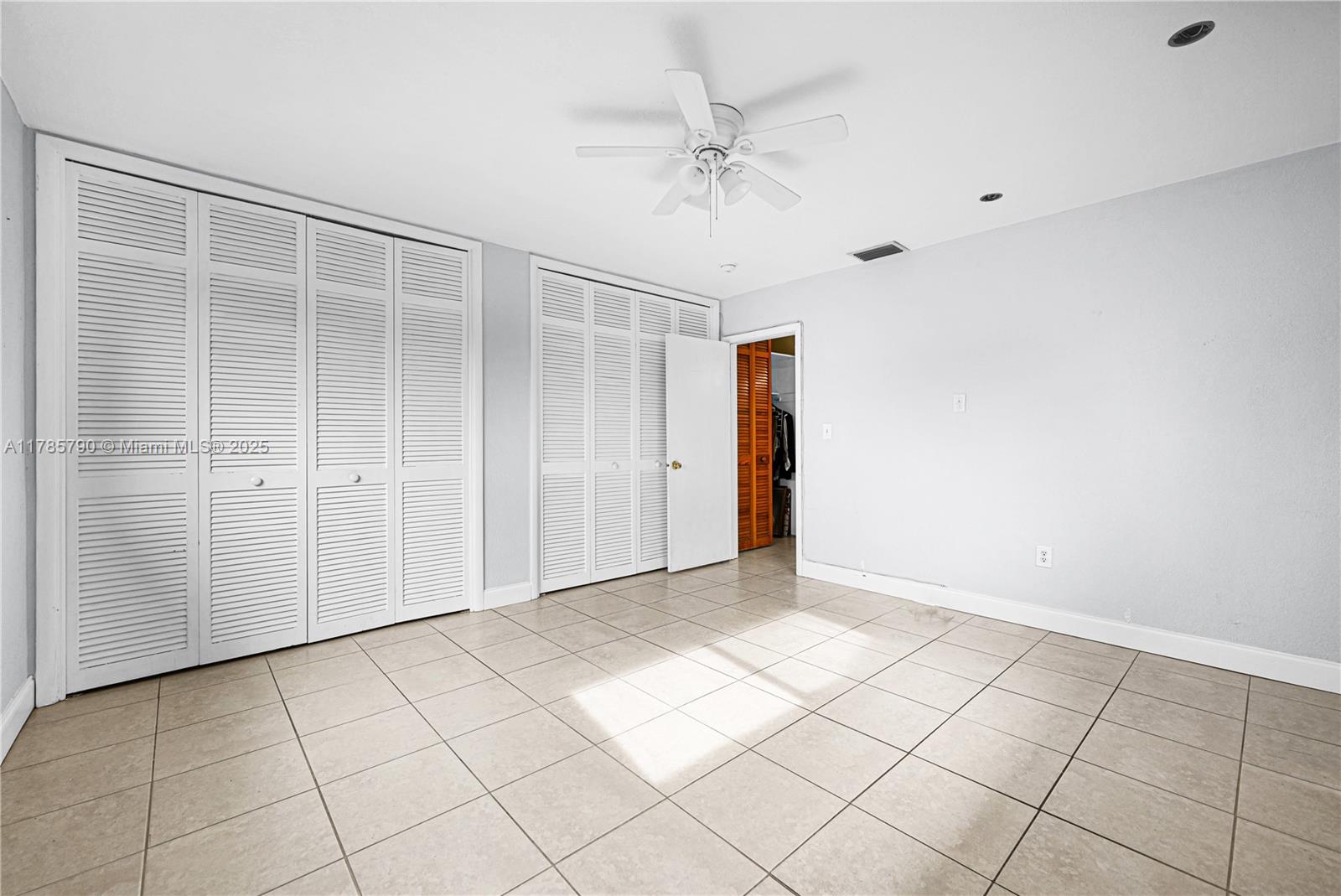 8451 Northwest 10th Street Pembroke Pines, FL 33024 - Photo 19 of 32 a view of an empty room