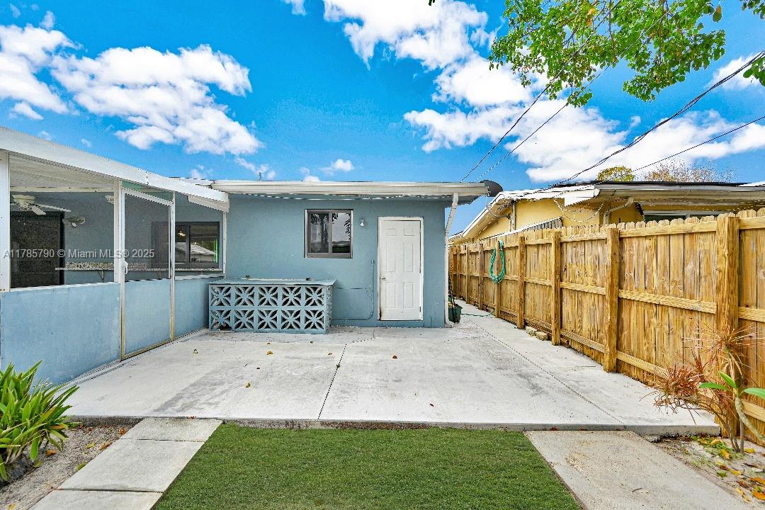 8451 Northwest 10th Street Pembroke Pines, FL 33024 - Photo 27 of 32 a view of backyard with a garden and deck