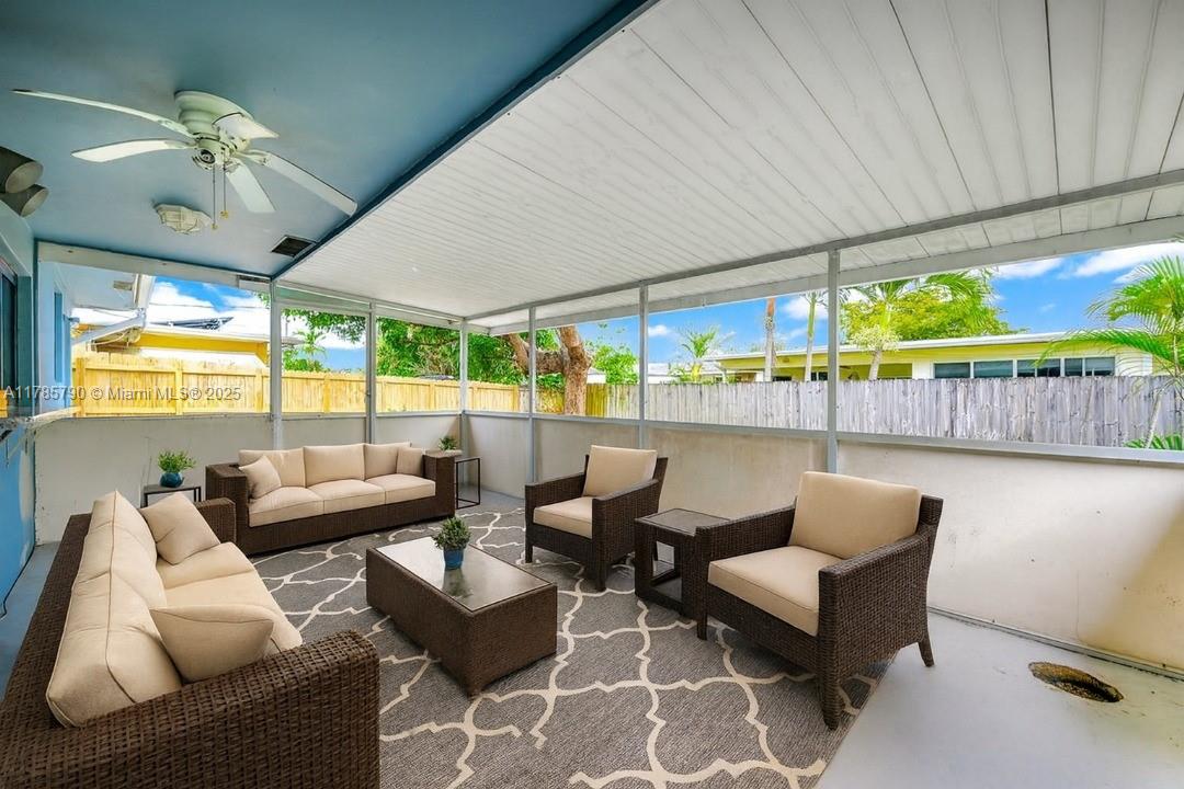 8451 Northwest 10th Street Pembroke Pines, FL 33024 - Photo 3 of 32 a living room with furniture and a large window