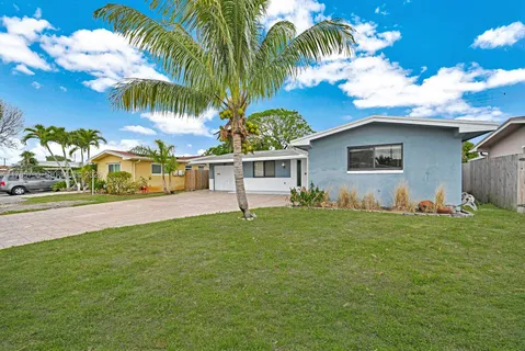 a house with a garden in front of it