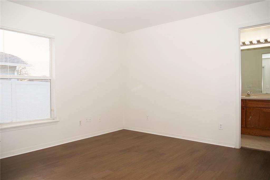 415 Danube Way Kissimmee, FL 34759 - Photo 14 of 17 an empty room with a window