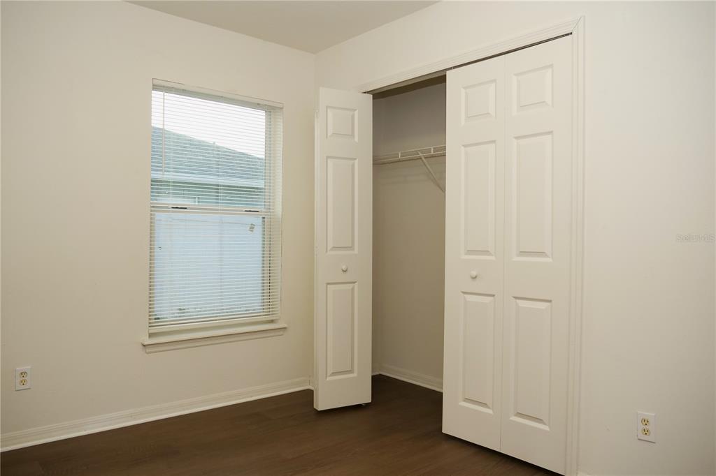 415 Danube Way Kissimmee, FL 34759 - Photo 7 of 17 an empty room with closet area