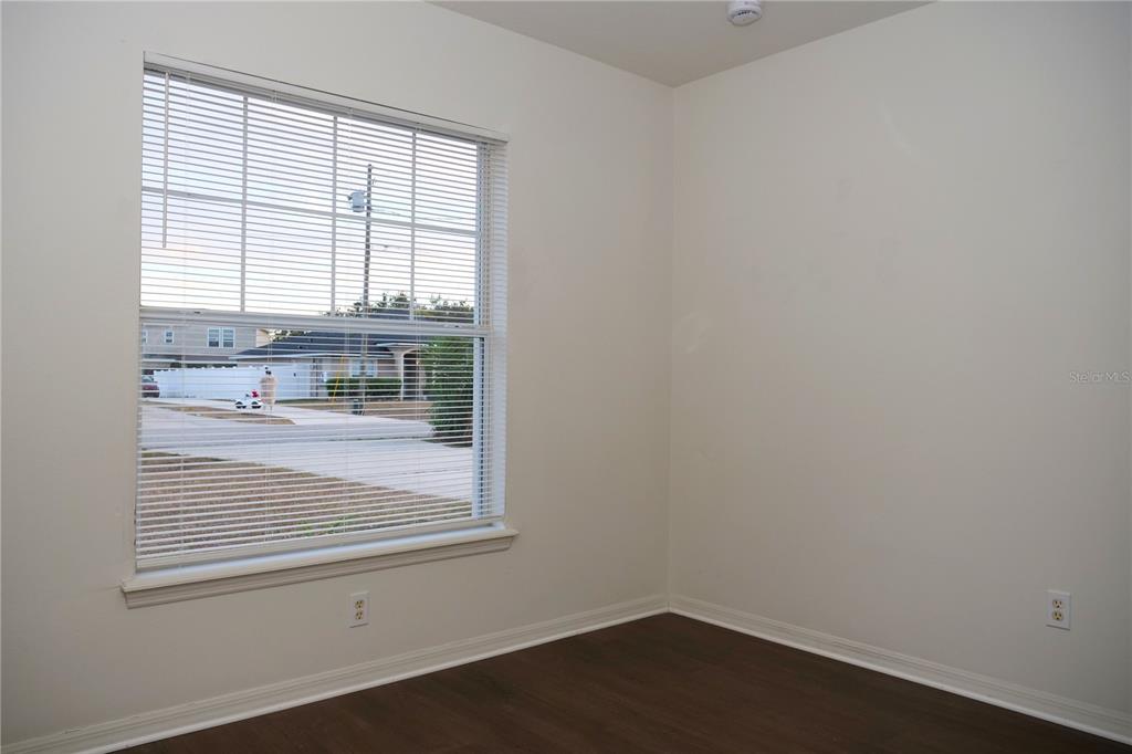 415 Danube Way Kissimmee, FL 34759 - Photo 8 of 17 an empty room with a window
