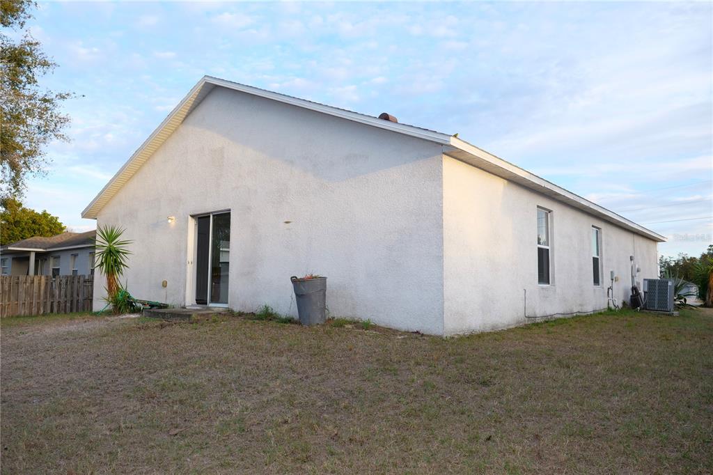 415 Danube Way Kissimmee, FL 34759 - Photo 9 of 17 a view of a house with backyard