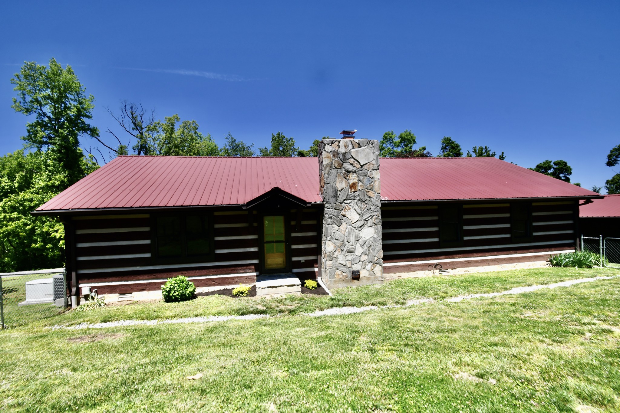 1342 Aetna Church Road Centerville, TN 37033 - Photo 5 of 59 a front view of a house with garden