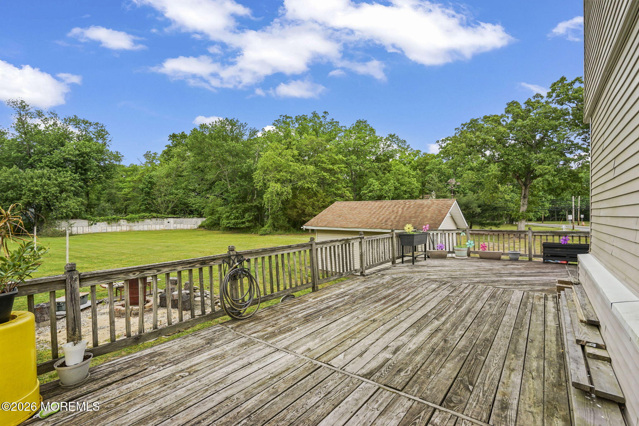 438 Bennetts Mills Road Jackson, NJ 08527 - Photo 24 of 42 a view of a balcony with wooden floor and fence