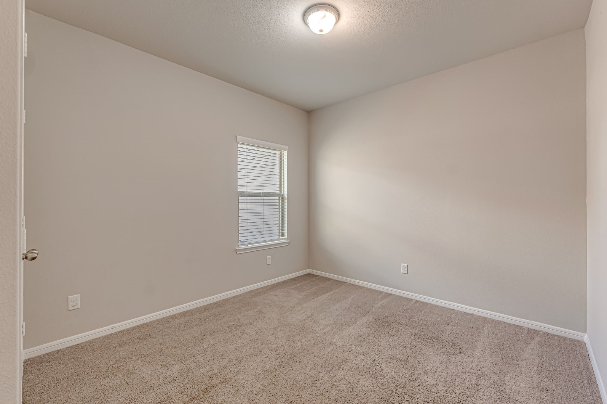 10314 Birch Peak Drive Rosharon, TX 77583 - Photo 16 of 38 an empty room with a window