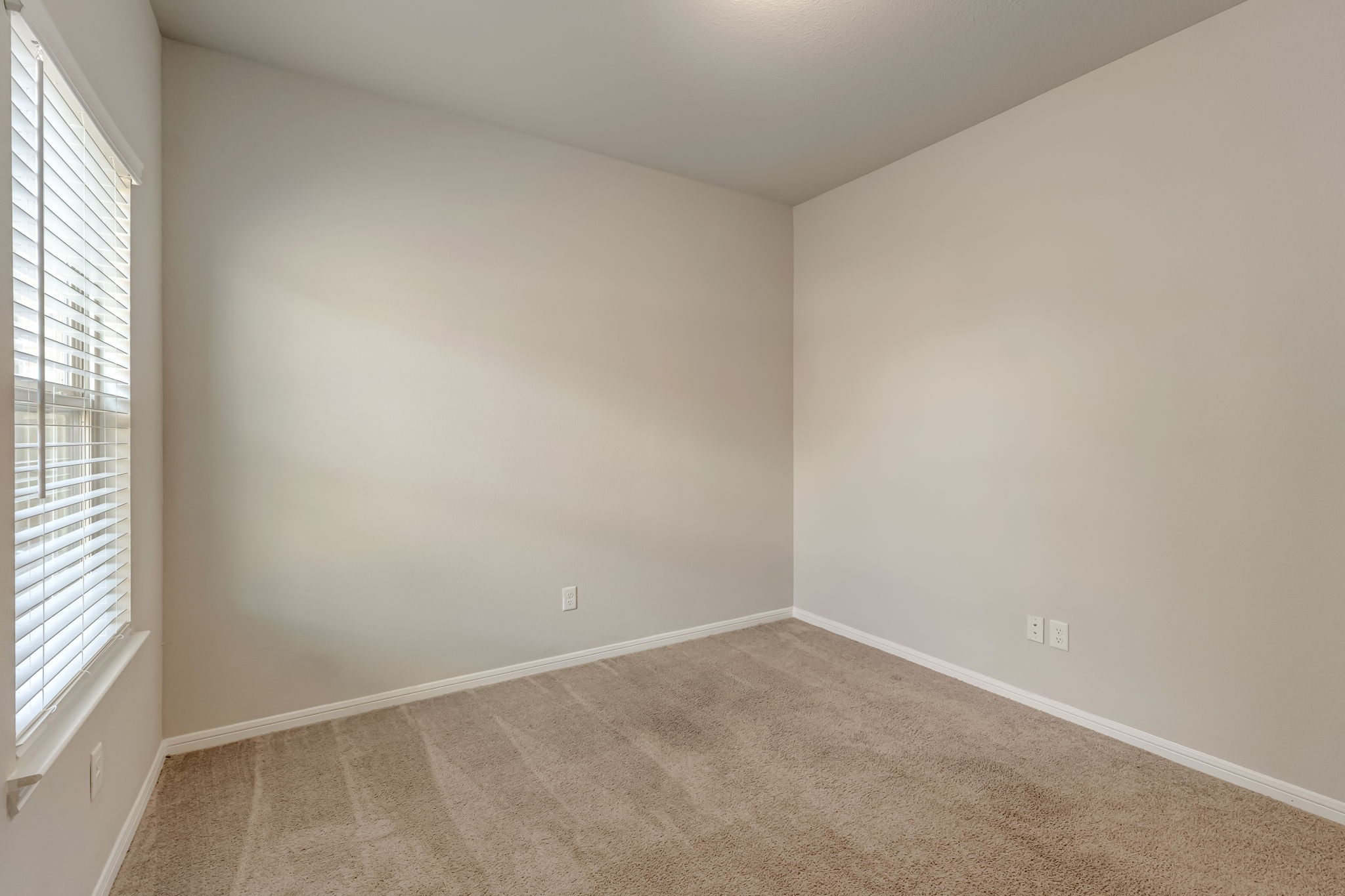10314 Birch Peak Drive Rosharon, TX 77583 - Photo 17 of 38 an empty room with a window