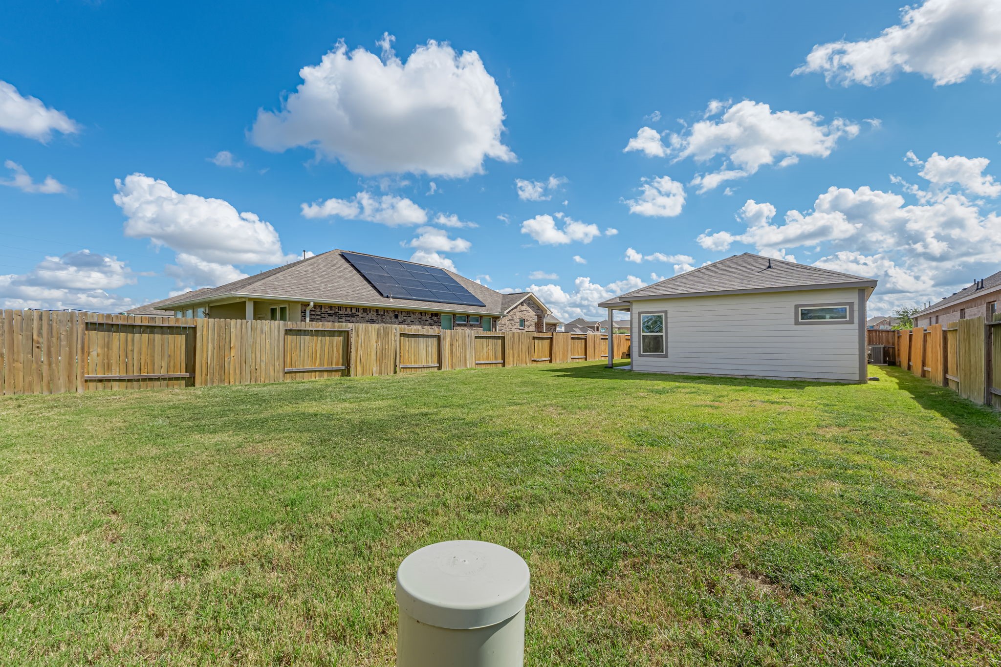 10314 Birch Peak Drive Rosharon, TX 77583 - Photo 29 of 38 a front view of a house with a garden