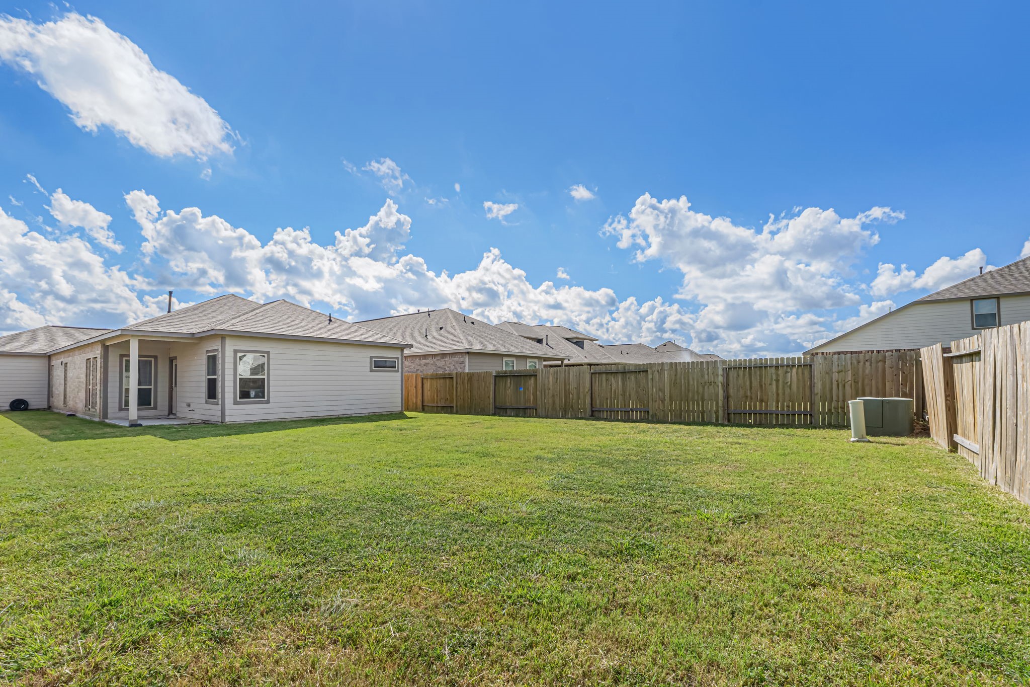10314 Birch Peak Drive Rosharon, TX 77583 - Photo 30 of 38 a view of a yard in front of a house