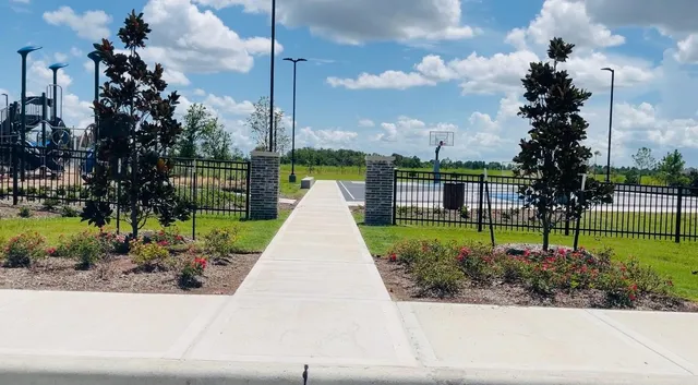 a view of a garden with a fountain