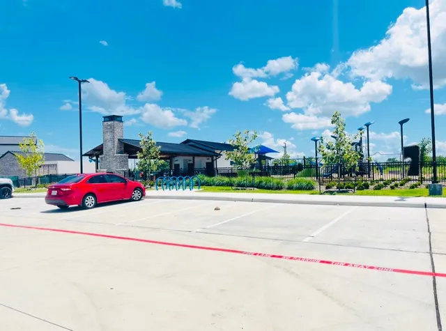 a view of a bench in front of a building
