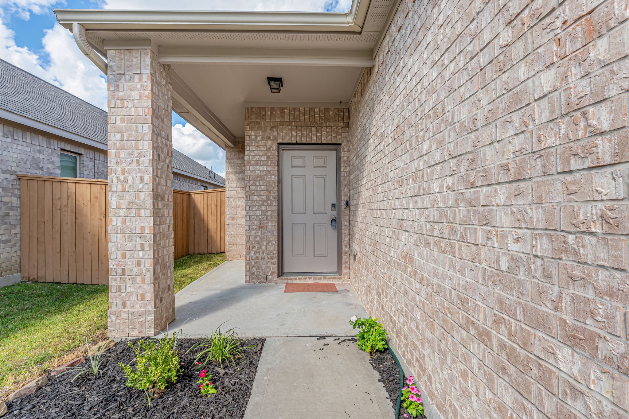 10314 Birch Peak Drive Rosharon, TX 77583 - Photo 6 of 38 a front view of a house with a garden