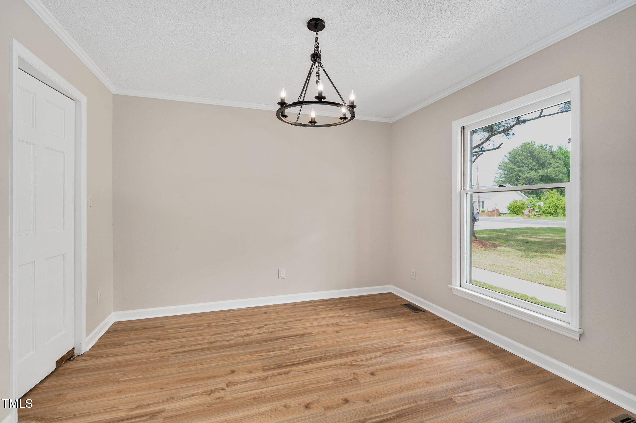 603 Warren Road Erwin, NC 28339 - Photo 10 of 38 a view of a room with wooden floor fan and a window