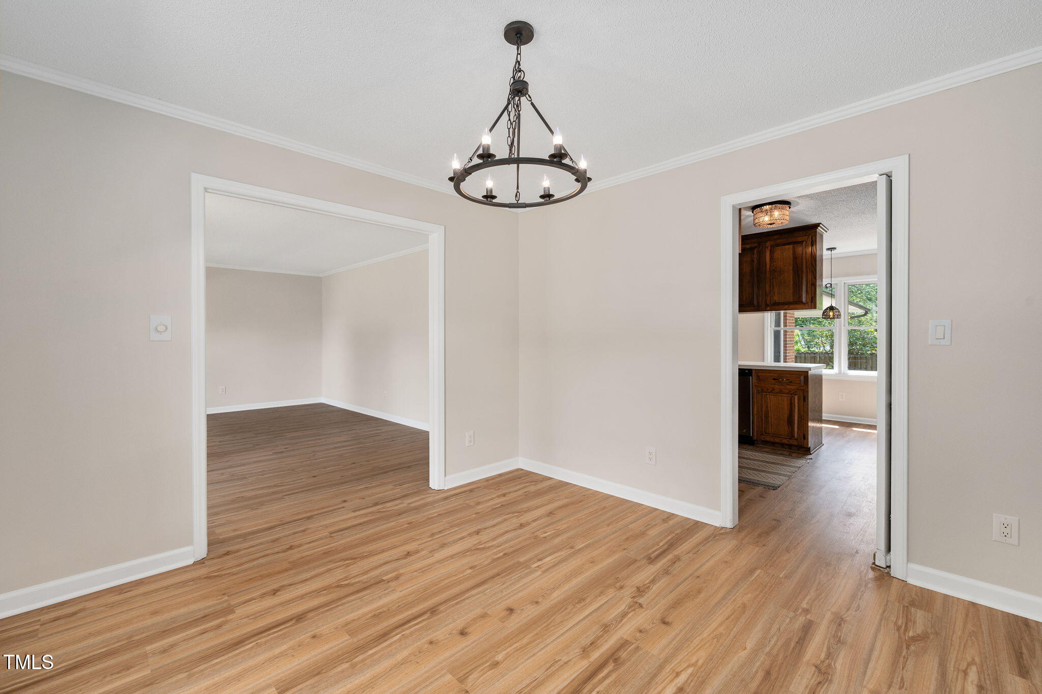 603 Warren Road Erwin, NC 28339 - Photo 11 of 38 a view of a room with wooden floor and ceiling fan