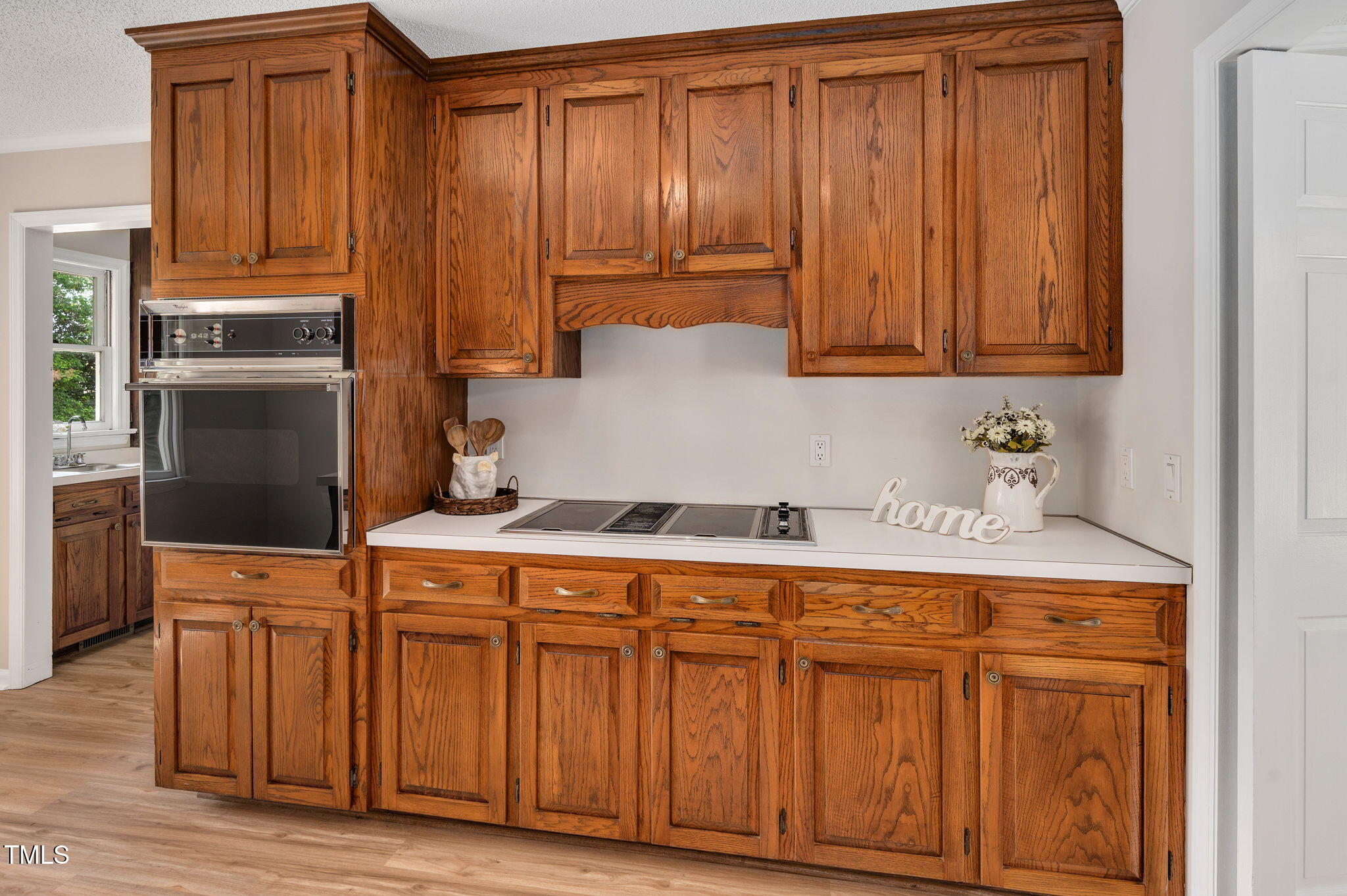 603 Warren Road Erwin, NC 28339 - Photo 13 of 38 a kitchen with stainless steel appliances granite countertop a refrigerator and a stove top oven