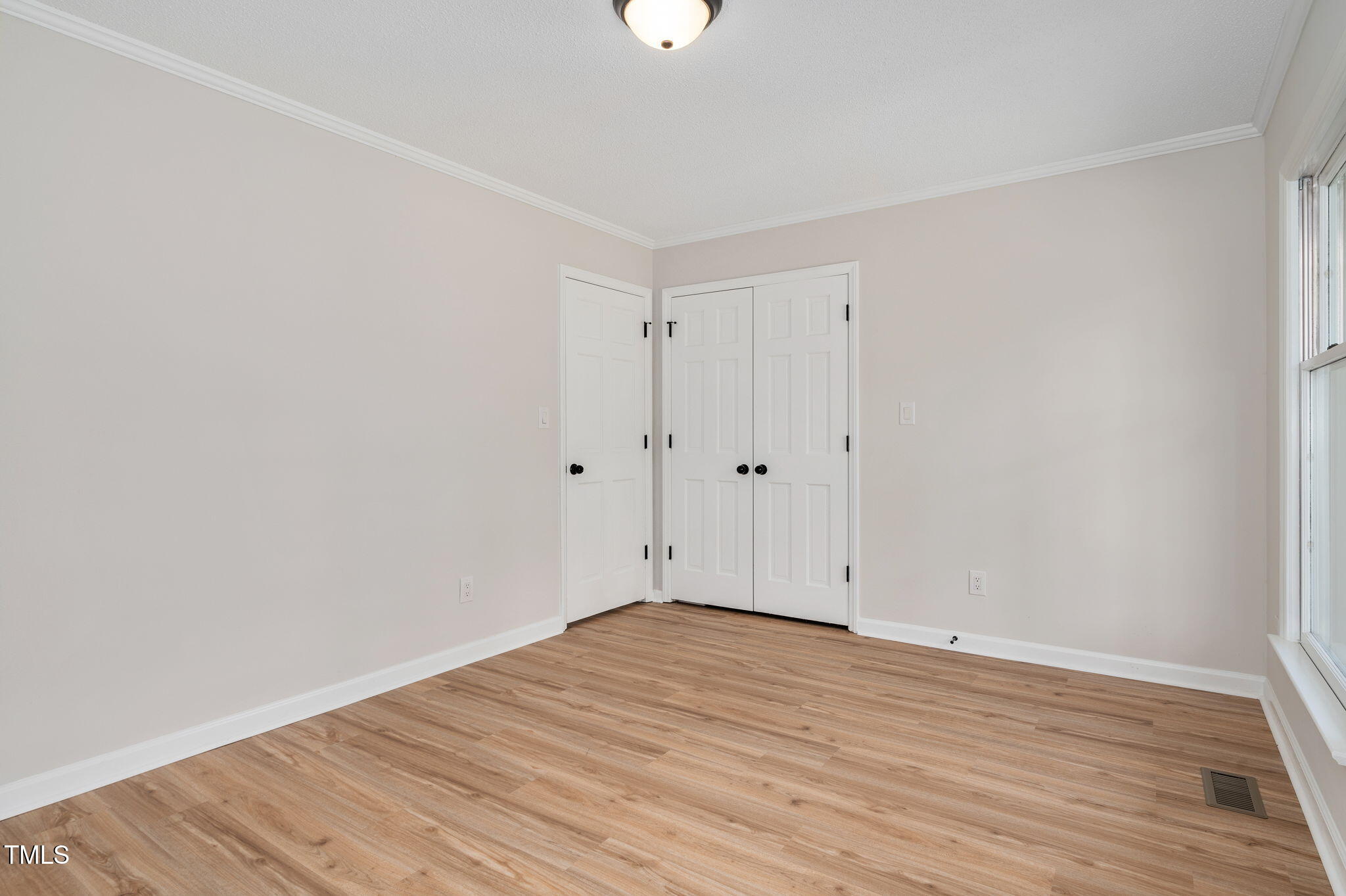 603 Warren Road Erwin, NC 28339 - Photo 31 of 38 a view of room with wooden floor