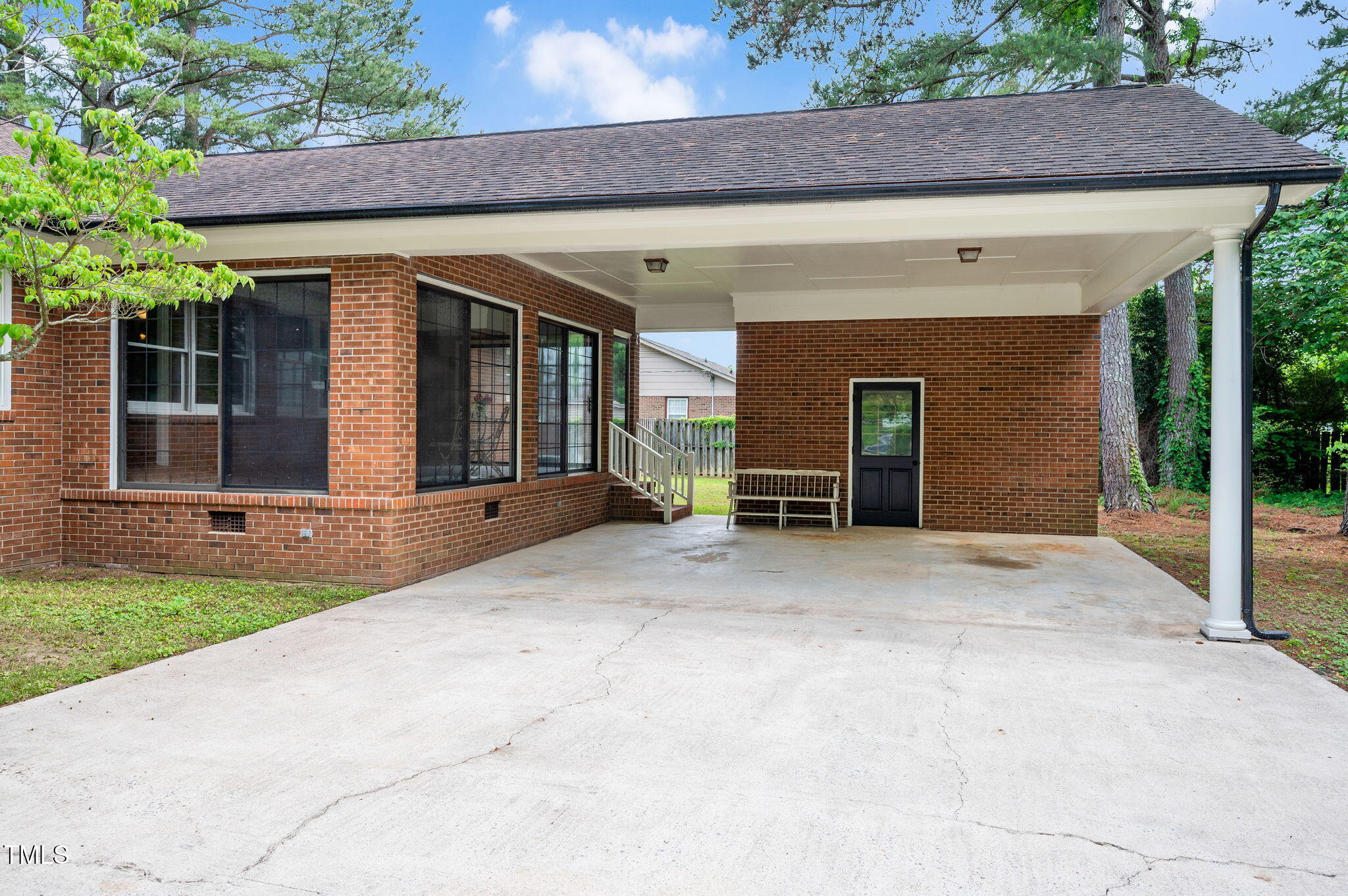603 Warren Road Erwin, NC 28339 - Photo 36 of 38 a front view of a house with a yard and garage